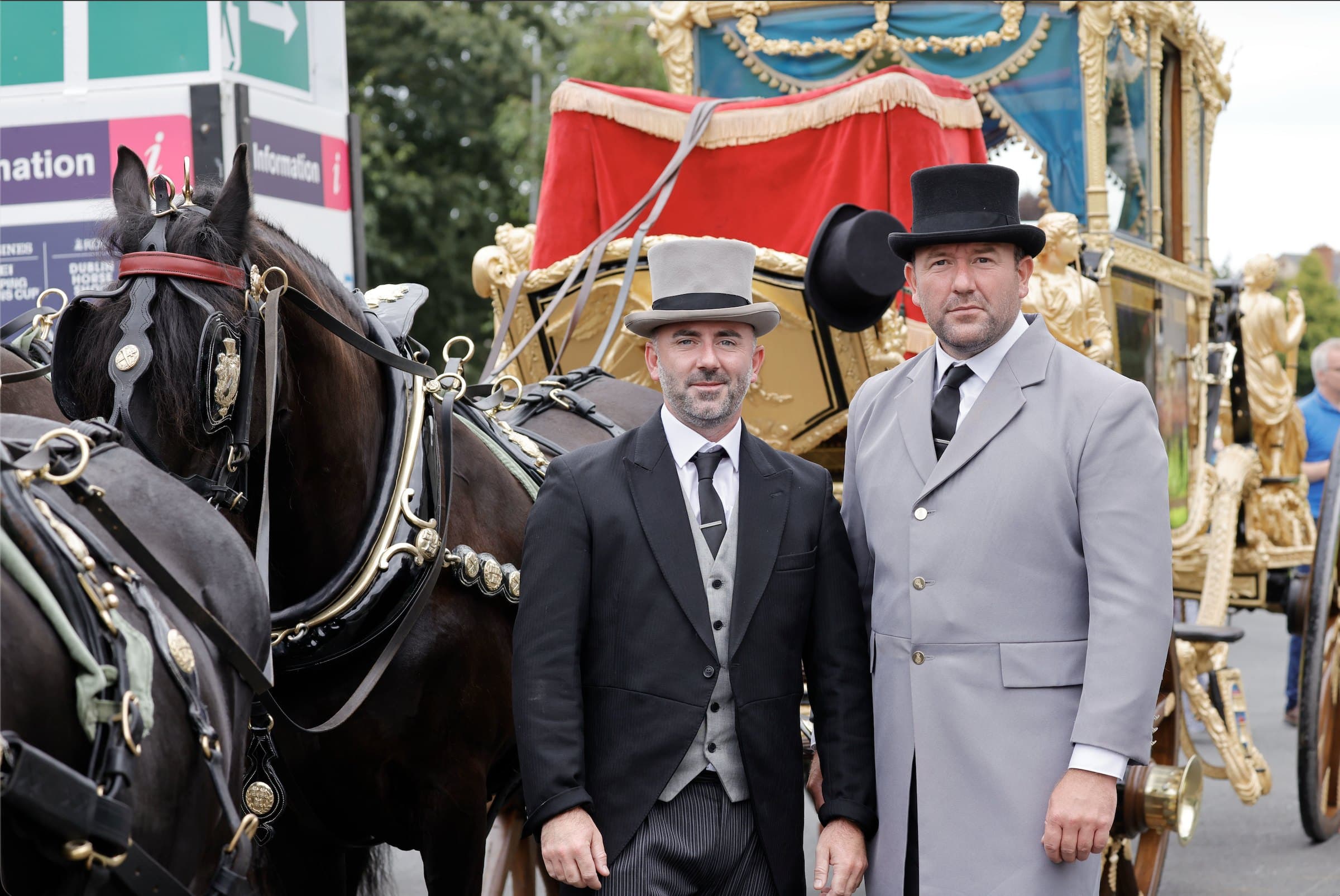 David and Brendan Mulreany in livery with the Lord Mayor of Dublin's state carriage at the RDS Dublin Horse Show